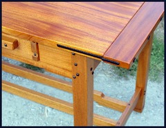 Detail Ebony splines and beveled square Ebony pegs on the edge of table and legs.